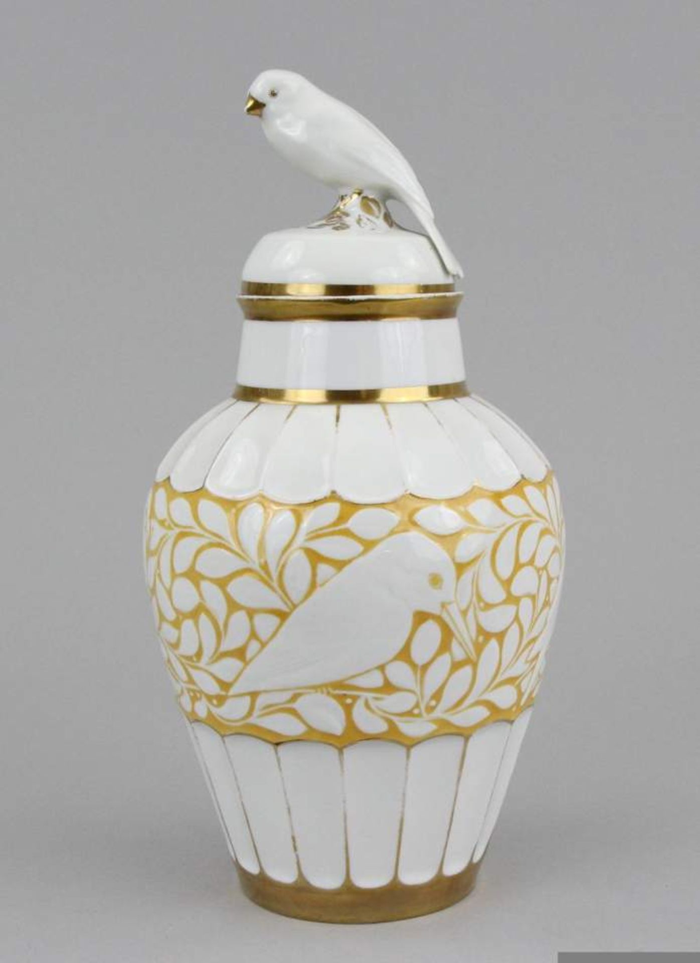 Lidded vase Porcelain with relief, birds with branches and leaves, a bird on the lid, manufakturer´s