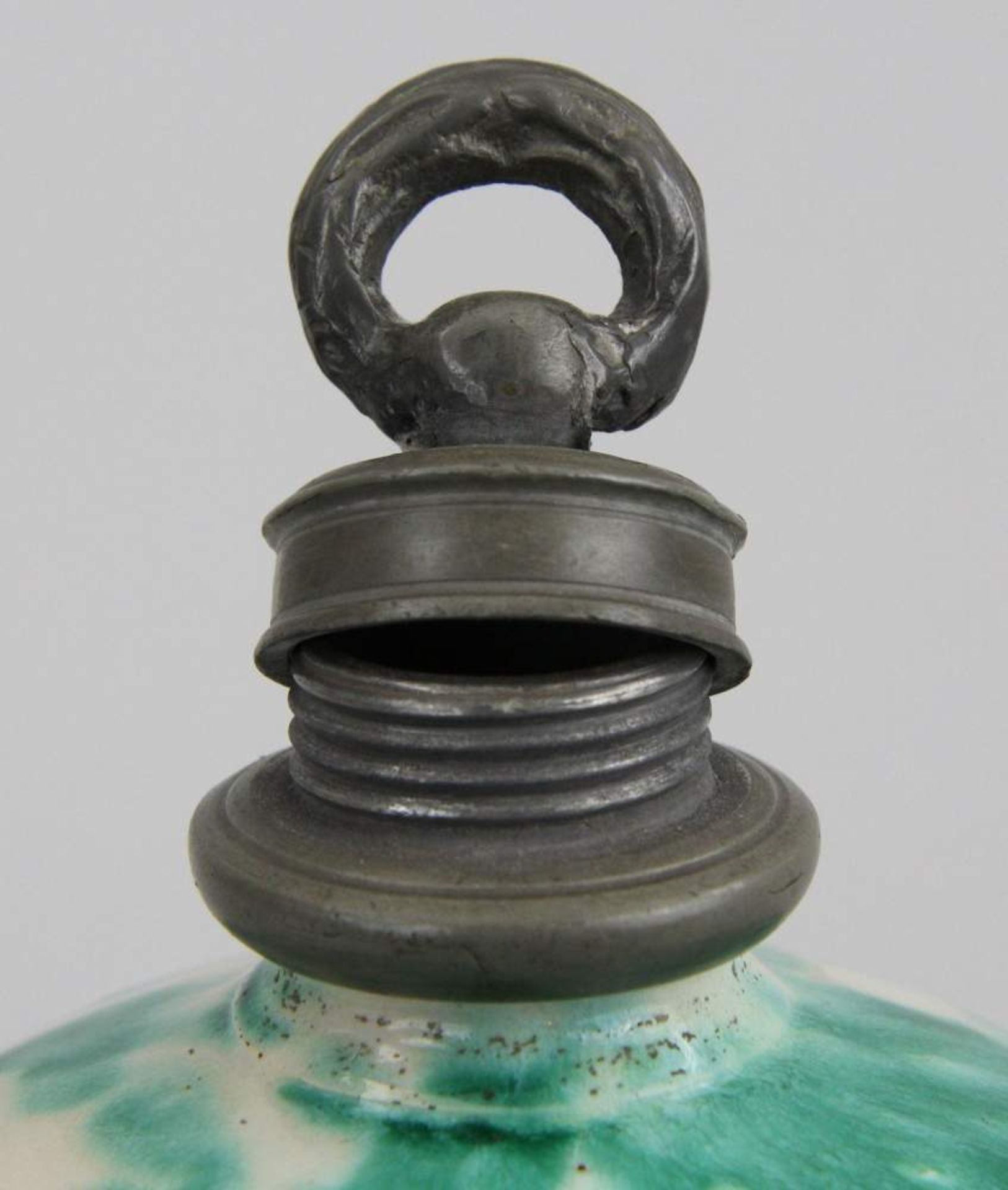 Bottle Green coloured faience, pewter mounting, h. 20.5 cm, Gmunden Austria c.1800, chip to the - Image 3 of 4