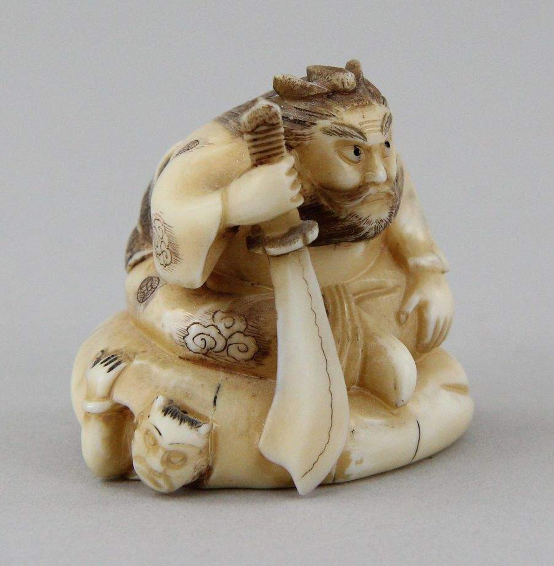 Netsuke "Sh?ki with Oni" Carved and partly coloured walrus tooth, sitting Sh?ki on a large - Image 4 of 5