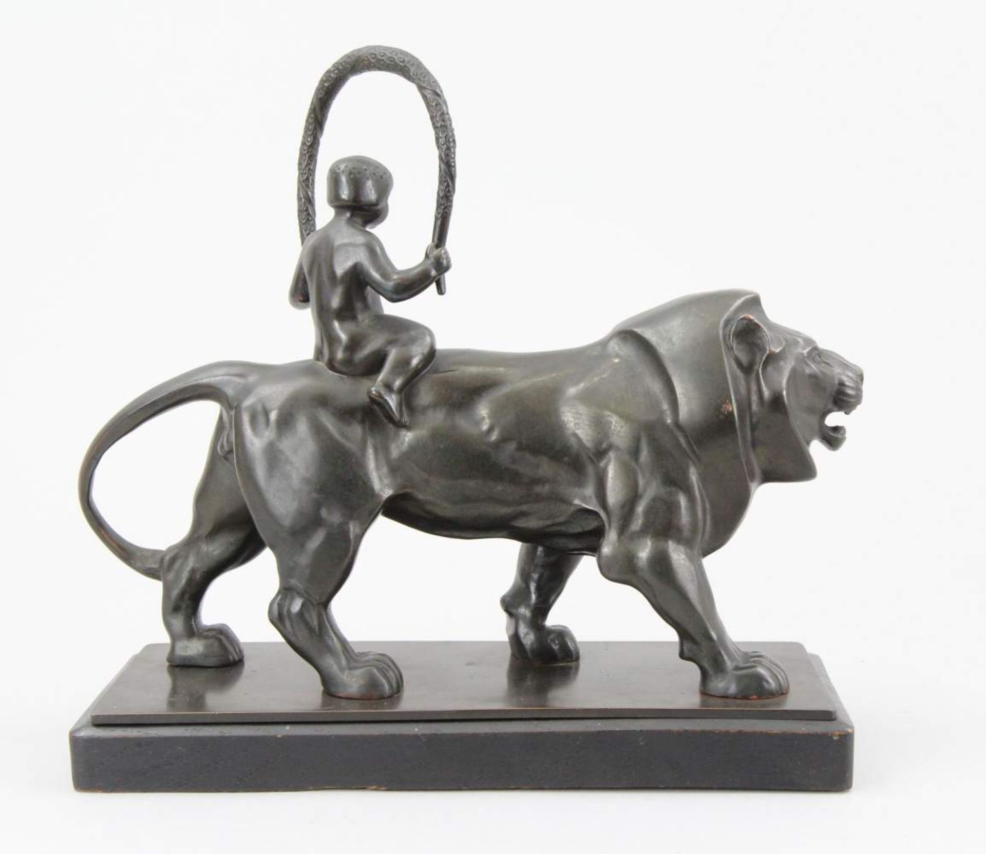 Germn early 20th century sculptor Figure, patinated bronze, naked boy riding a lion, original wooden - Image 3 of 3