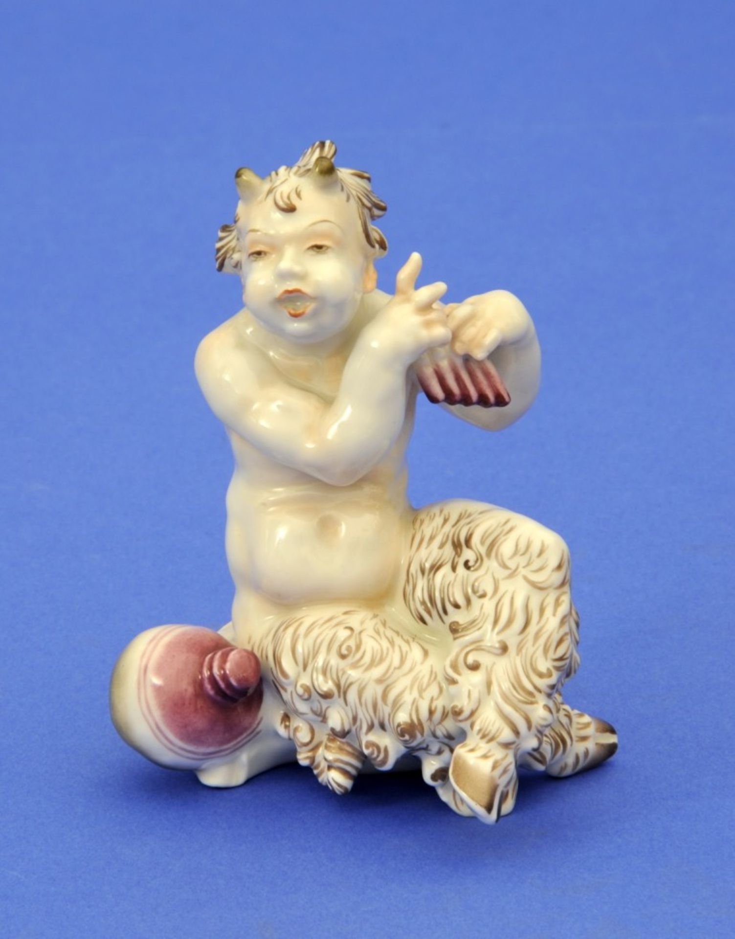 Figur,Sitzender Faun mit Flöte, Hutschenreuther Kunstabteilung, Signatur RH, Bemalung, Höhe 11 cm,