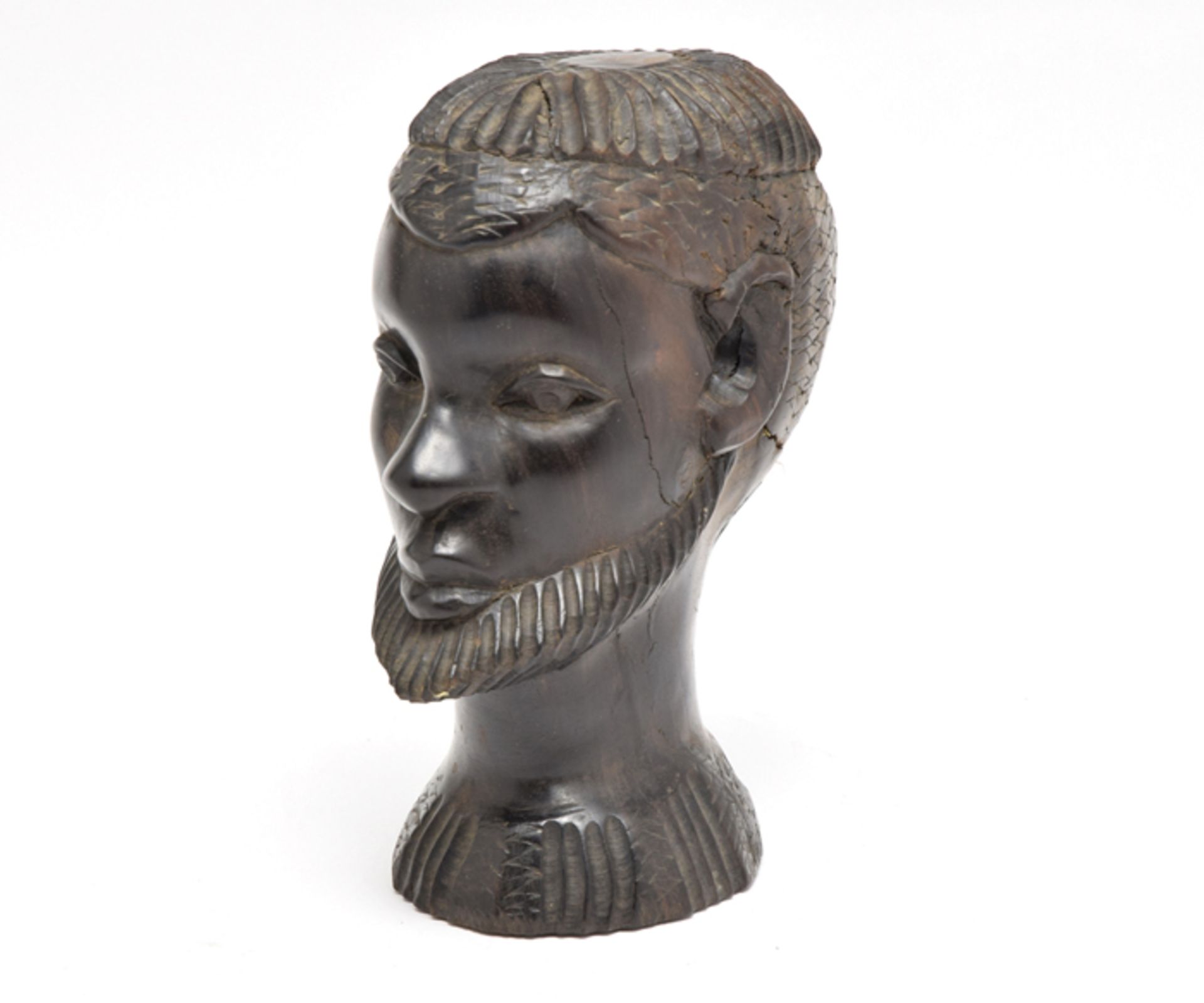 Portraitkopf eines Mannes; Afrika, Mitte 20. Jhd.; Hartholz vollplastisch geschnitzt; H = 21