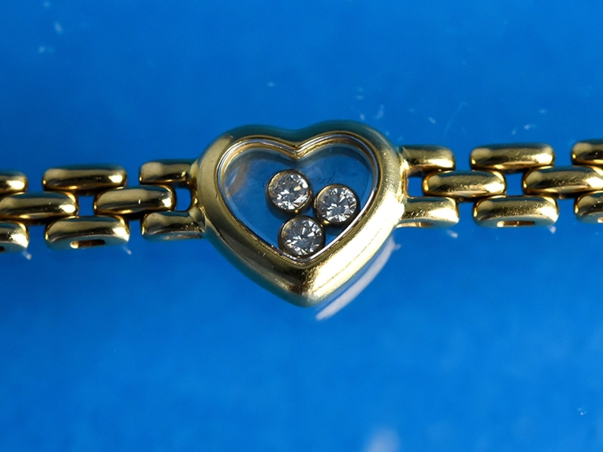 Armband mit 3 kleinen Brillanten, aus der Serie Happy Diamond, von Chopard, 20. Jh.    750/-