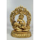 Vaishravana auf seinem Löwen, Bronze vergoldet, Vaishravana auf Lotussockel, in der linken Hand hält