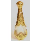Gold mounted crystal scent bottle the base and top gold mounted and pierced with scrolling.