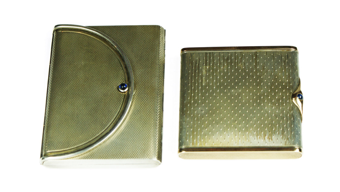 Two silver compacts, the larger one in the form of an envelope marked “925 sterling”, the smaller