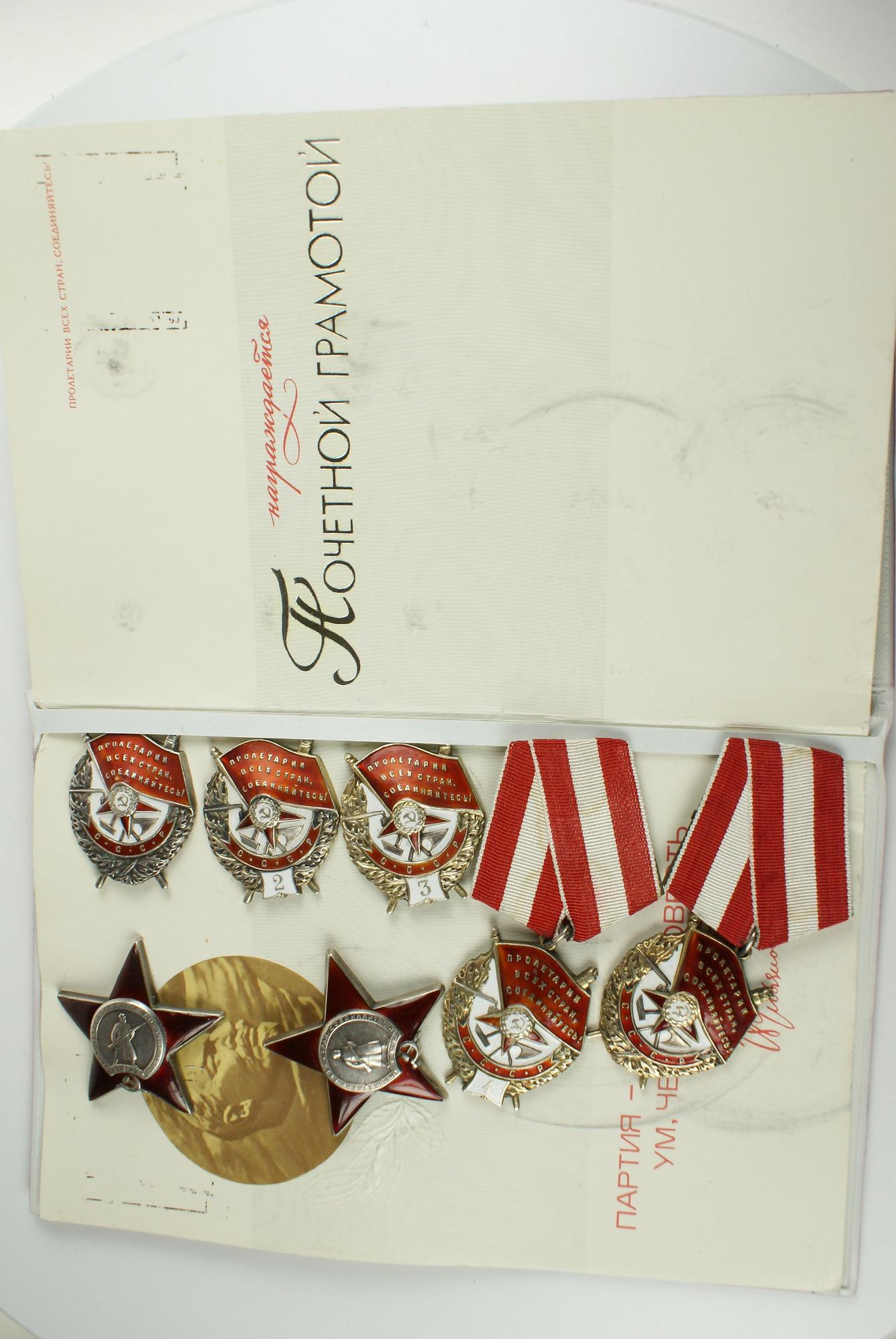 A USSR certificate of honour with an Order book. The set belonged to Mark Markovich Chumak and was