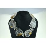 Rock crystal necklace with inlaid 18ct yellow gold by Abigail Sands.
Abigail Sands biographyFor