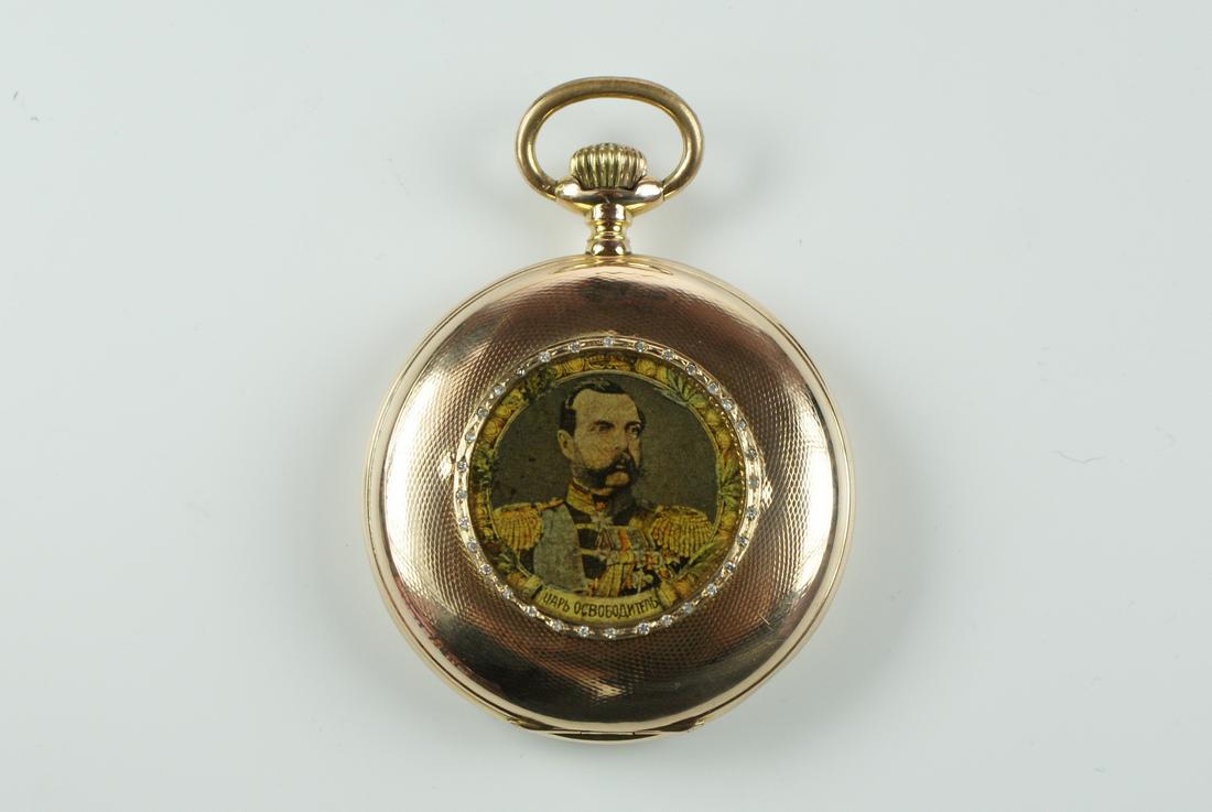 14ct gold hunter pocket watch by PAUL GARNIER with portrait of an officer on the case. Lever