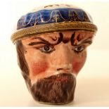 A Bilston enamel Neptune head" bonbonnaire. the top and base painted with flowers. English c1780 for