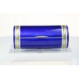 An unusual cigarette case, in rounded form, decorated with blue guilloche enamel, set with a diamond