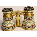 A Fine pair of French champlevé Enamel Opera Glasses with matching enamel around the rock crystal