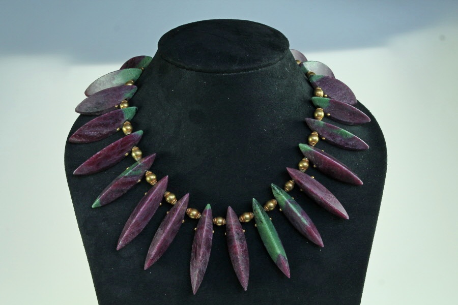 Ruby rusite necklace (ruby and emerald quartz mined) with 18ct Gold Beads by Abigail Sands.
Abigail