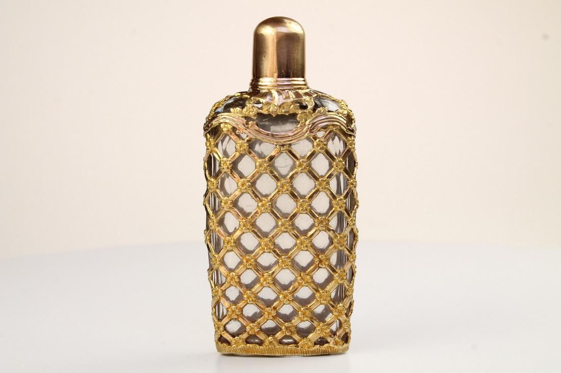 A very Fine and large gold cage work bottle c 1780. In the original shagreen case the bottle is