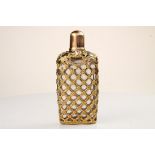 A very Fine and large gold cage work bottle c 1780. In the original shagreen case the bottle is