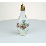 A rare Berlin perfume bottle painted with swages of flowers, the top with a gilt metal mounted