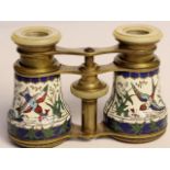 A Fine pair of French enamelled opera glasses with mother of pearl eye pieces the barrels