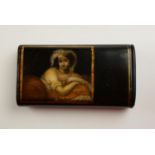 This cigar case depicts a women laying in a seductive pose, her night wear hangs lose over the top