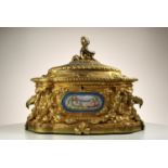 The sides with serves  turquoise panels the front depicting two cherubs holding garlands of