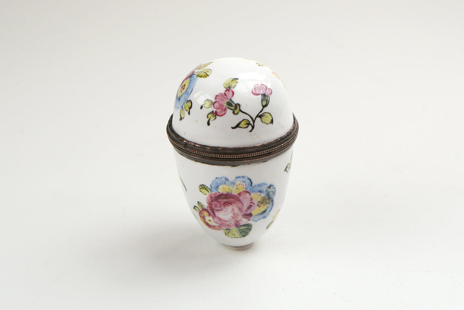 Fine Bilston enamel Nut Meg grater . the white ground painted with summer flowers the top and