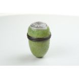 A fine Bilston enamel nutmeg grater with with mottled lime green surface the lid bearing the