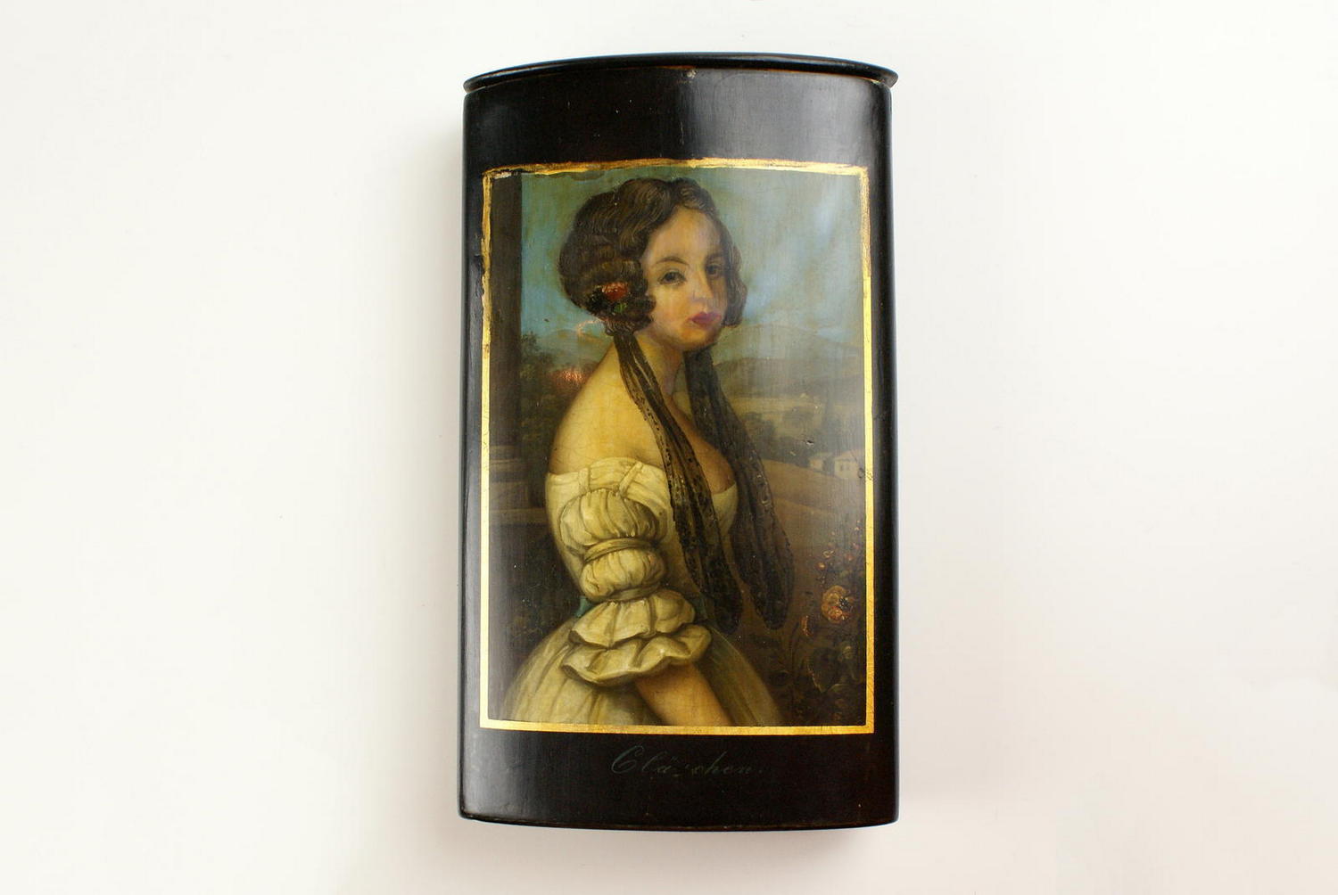 Here we have another young lady depicted on this case, the remarkable thing is this one is titled