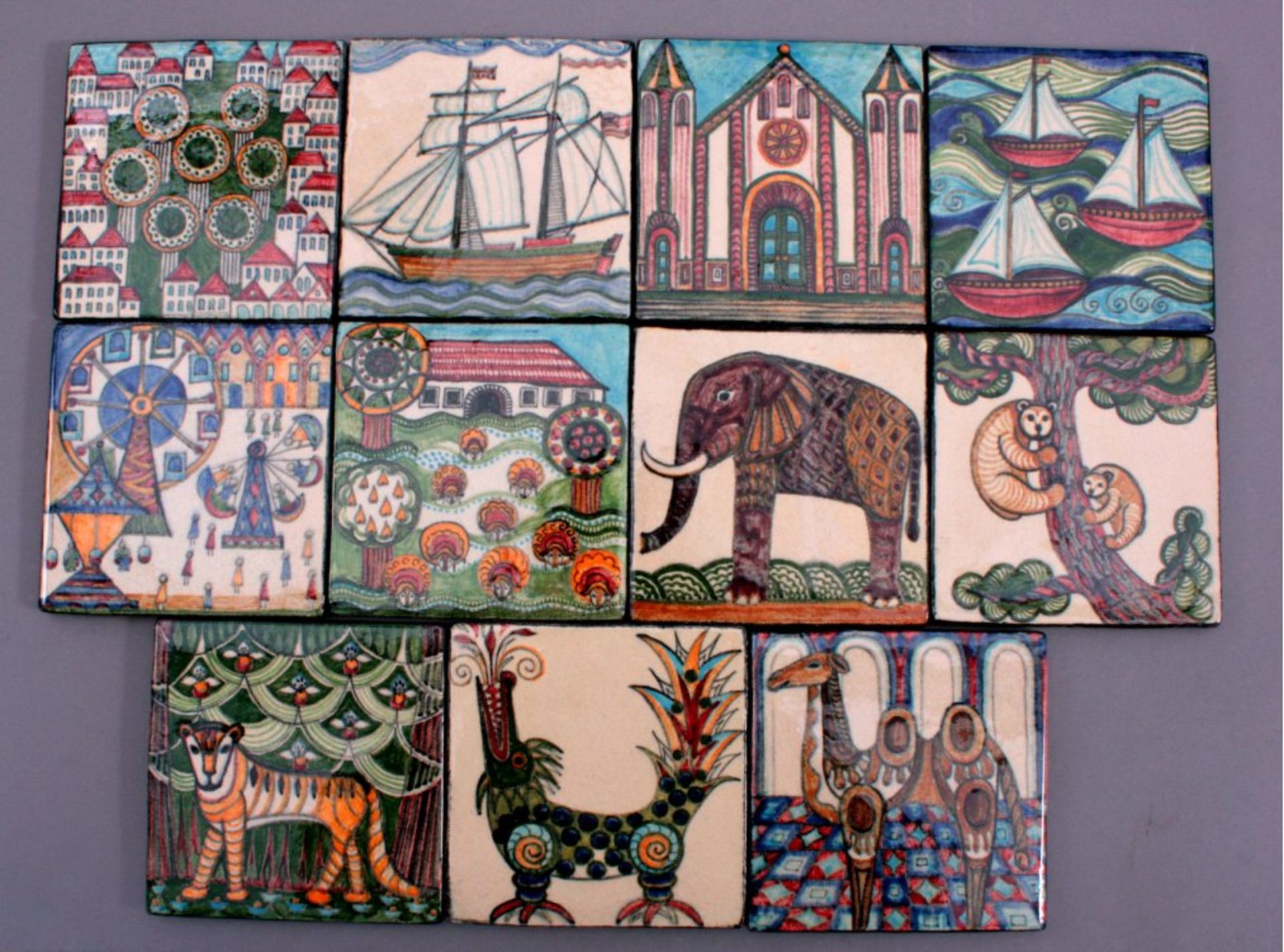 11 Künstlerkacheln Motiv: Orientalische Tiere und Gebäudebeiger Scherben, ca. 14x14