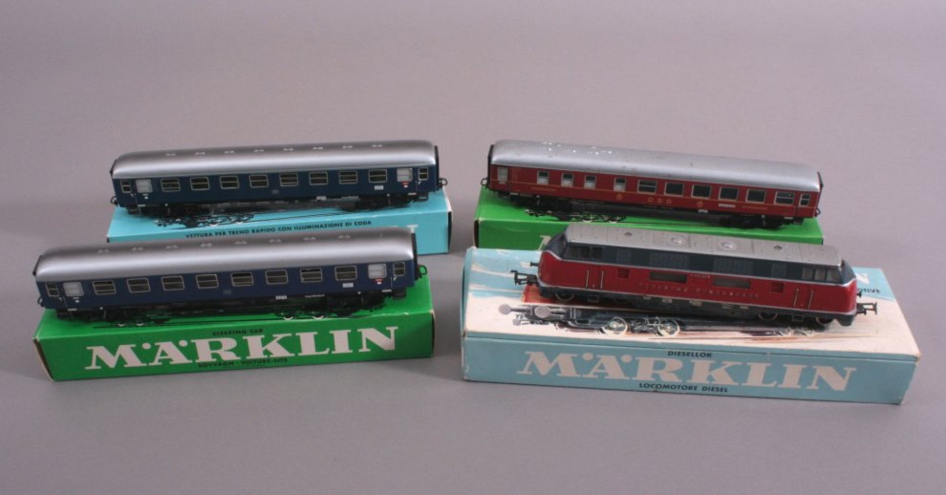 Märklin Diesellok mit 3 Personenwagen Spur H0Nr. 3021, 4023, 4029 und 4032, in Original