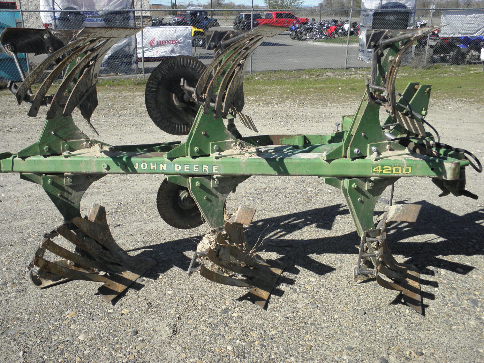 JD 4200 3 bottom spinner plow slatted