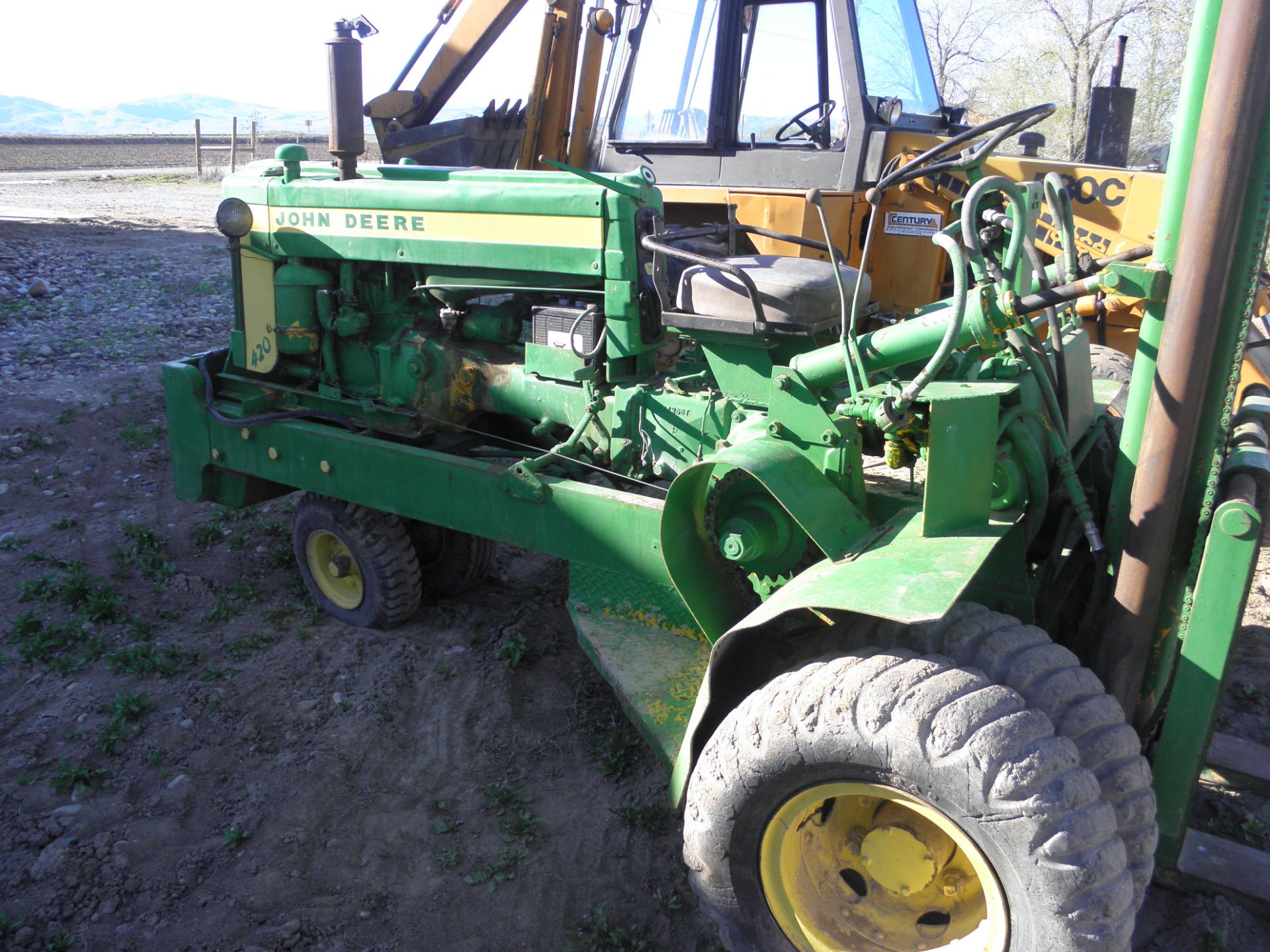 JD 420 tractor with forklift conversion