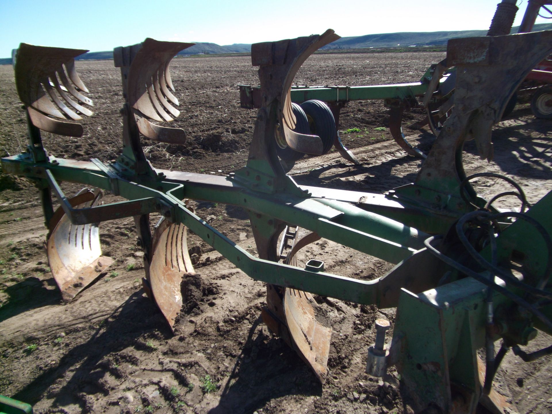 JD 4200 4 bottom spinner plow slatted