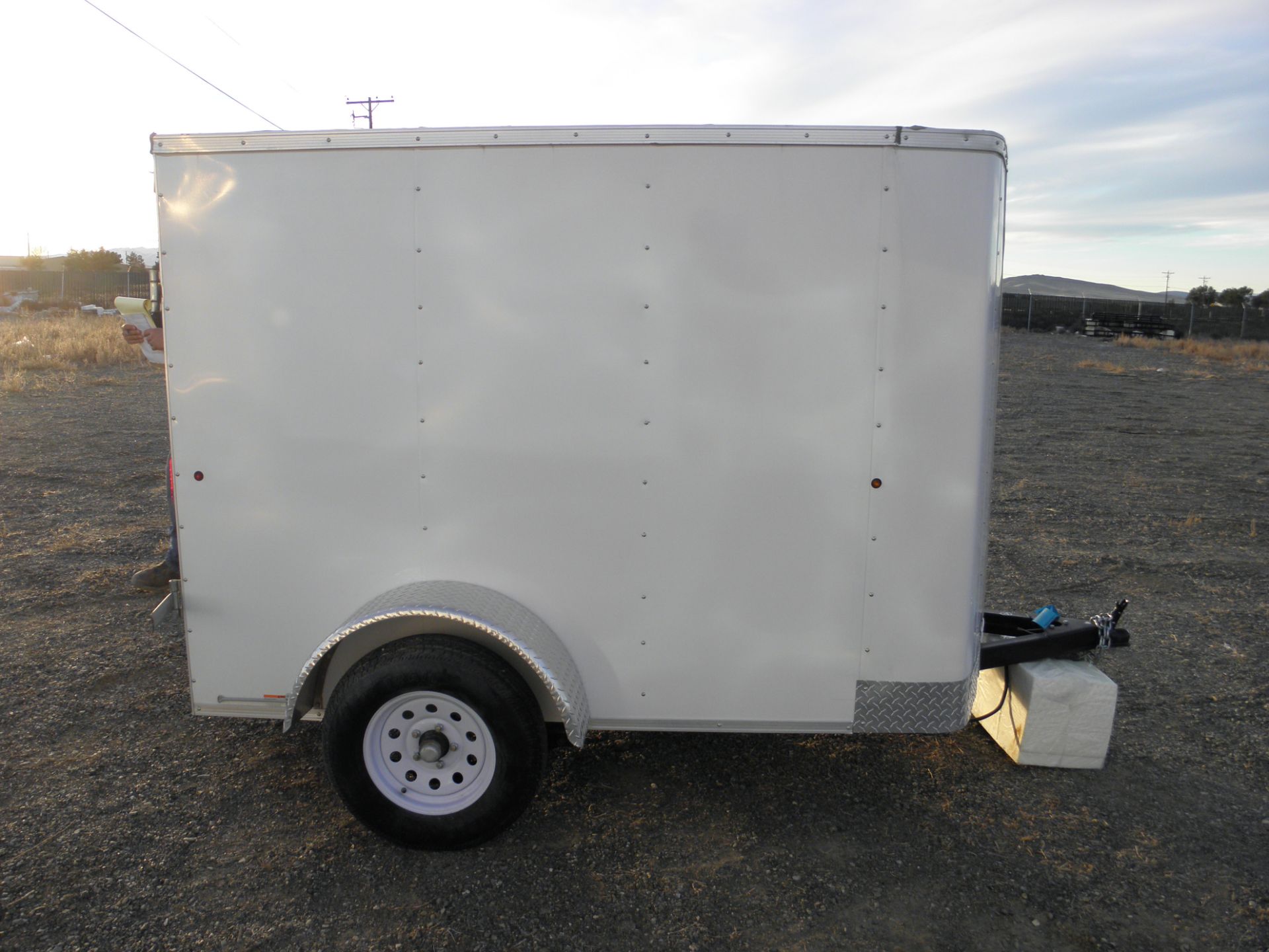 2015 5' X 8' single axle enclosed cargo, single back door, needs door latch