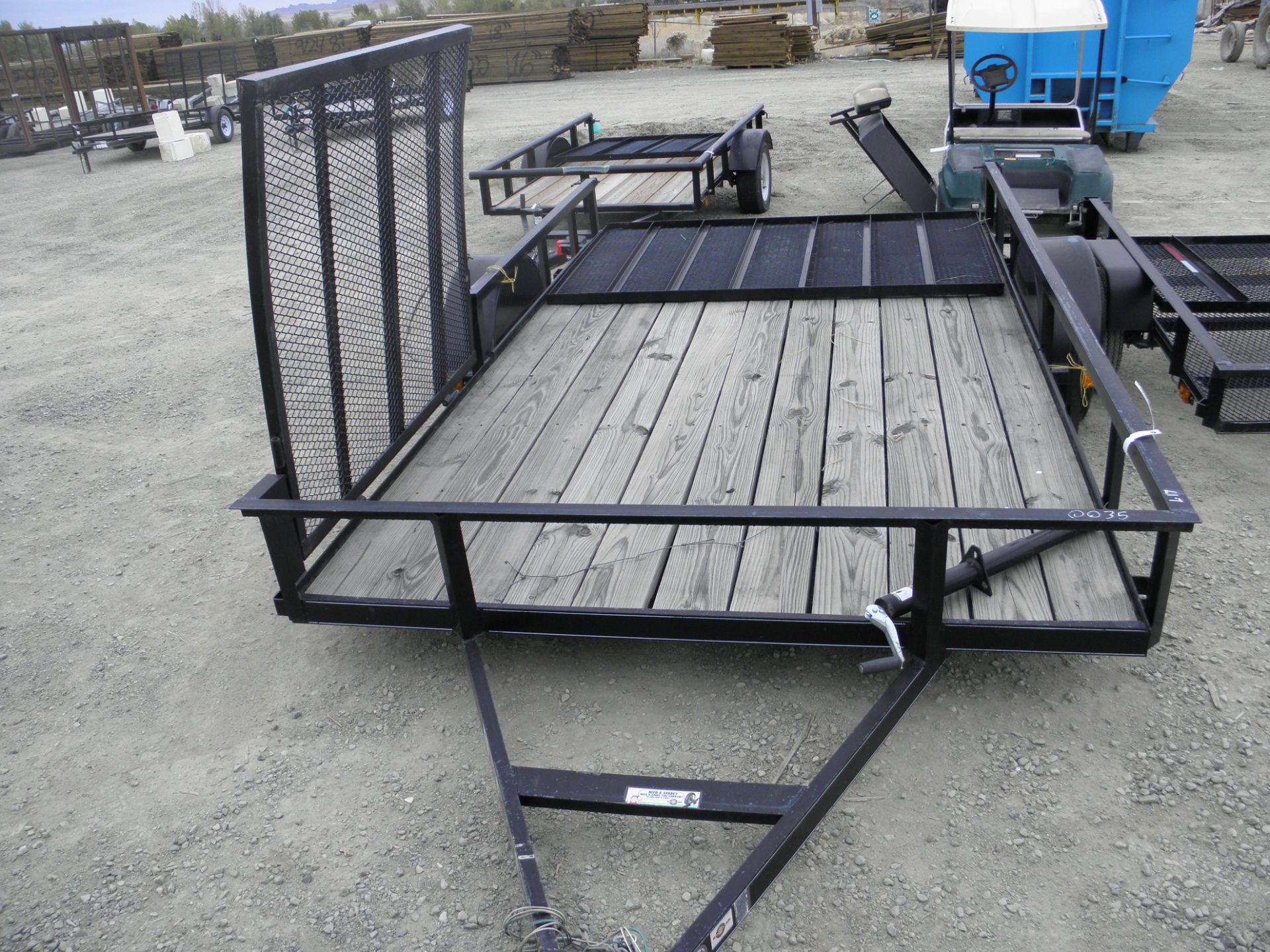 7' X 12' single axle flatbed w/rail sides, rear & side fold up ramps, used