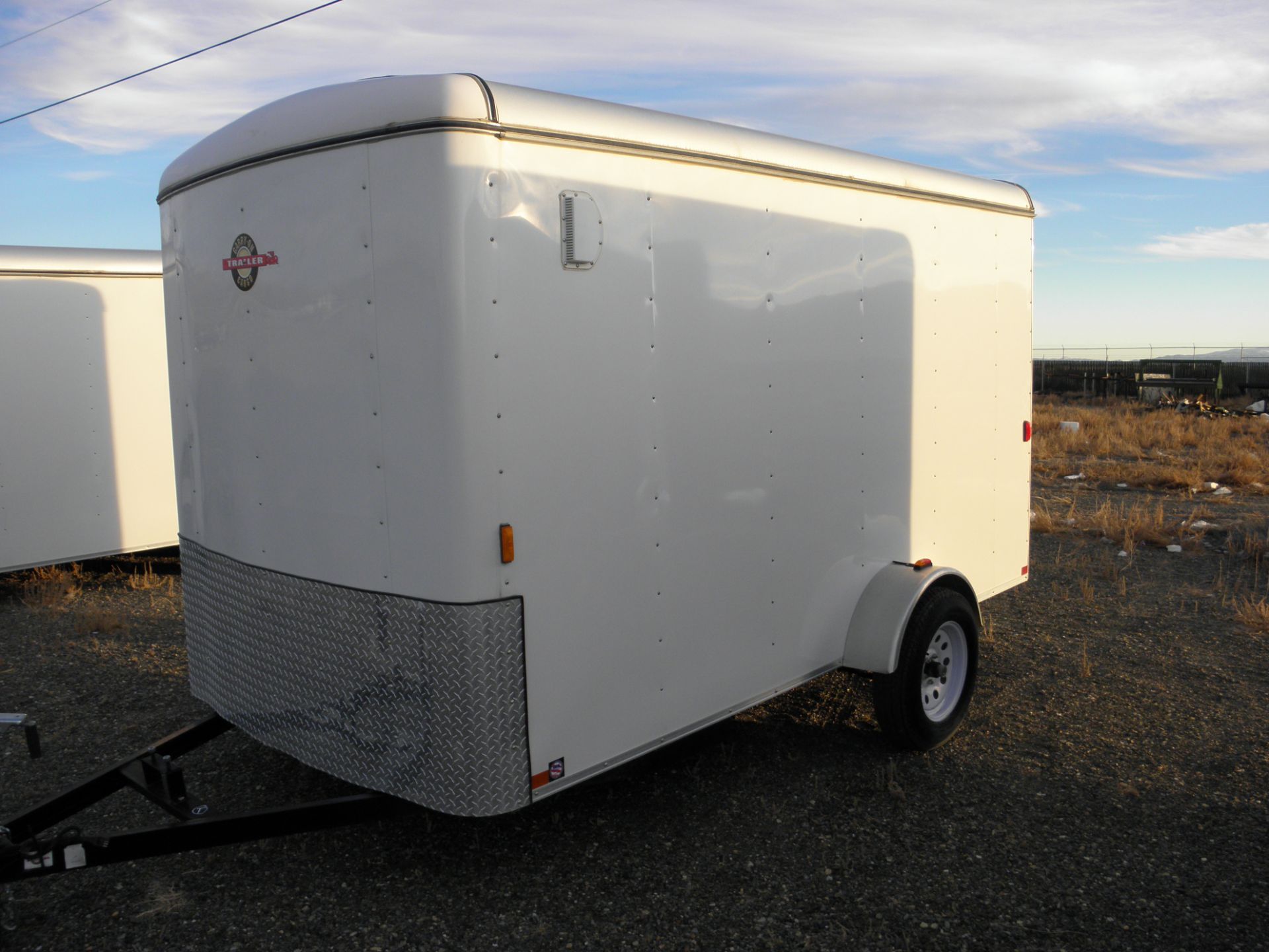 6' X 12' single axle enclosed cargo, fold down rear door, wood lined, white