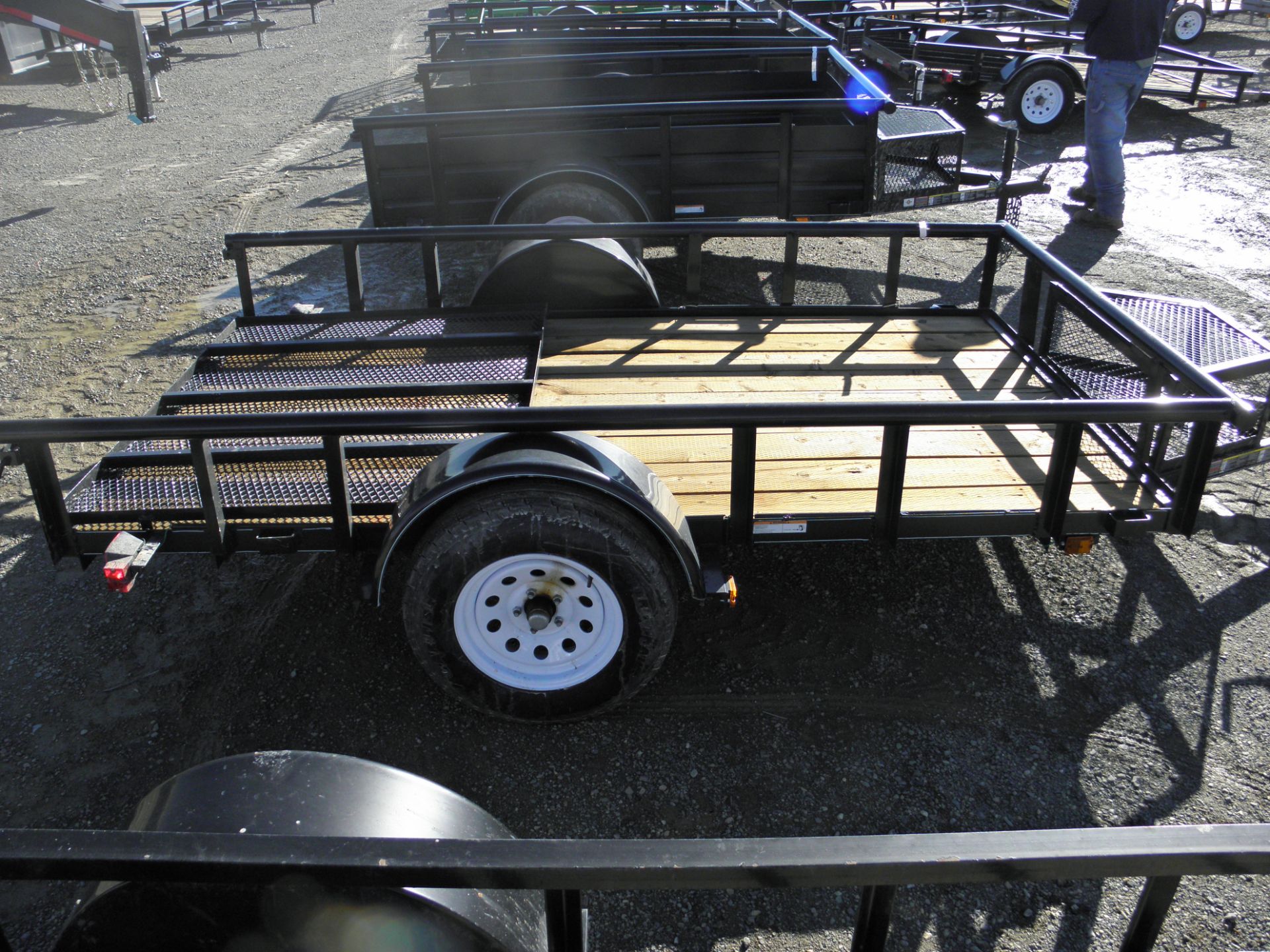 5.5' X 10' single axle flatbed w/pipe sides, expanded metal tailgate, wood deck