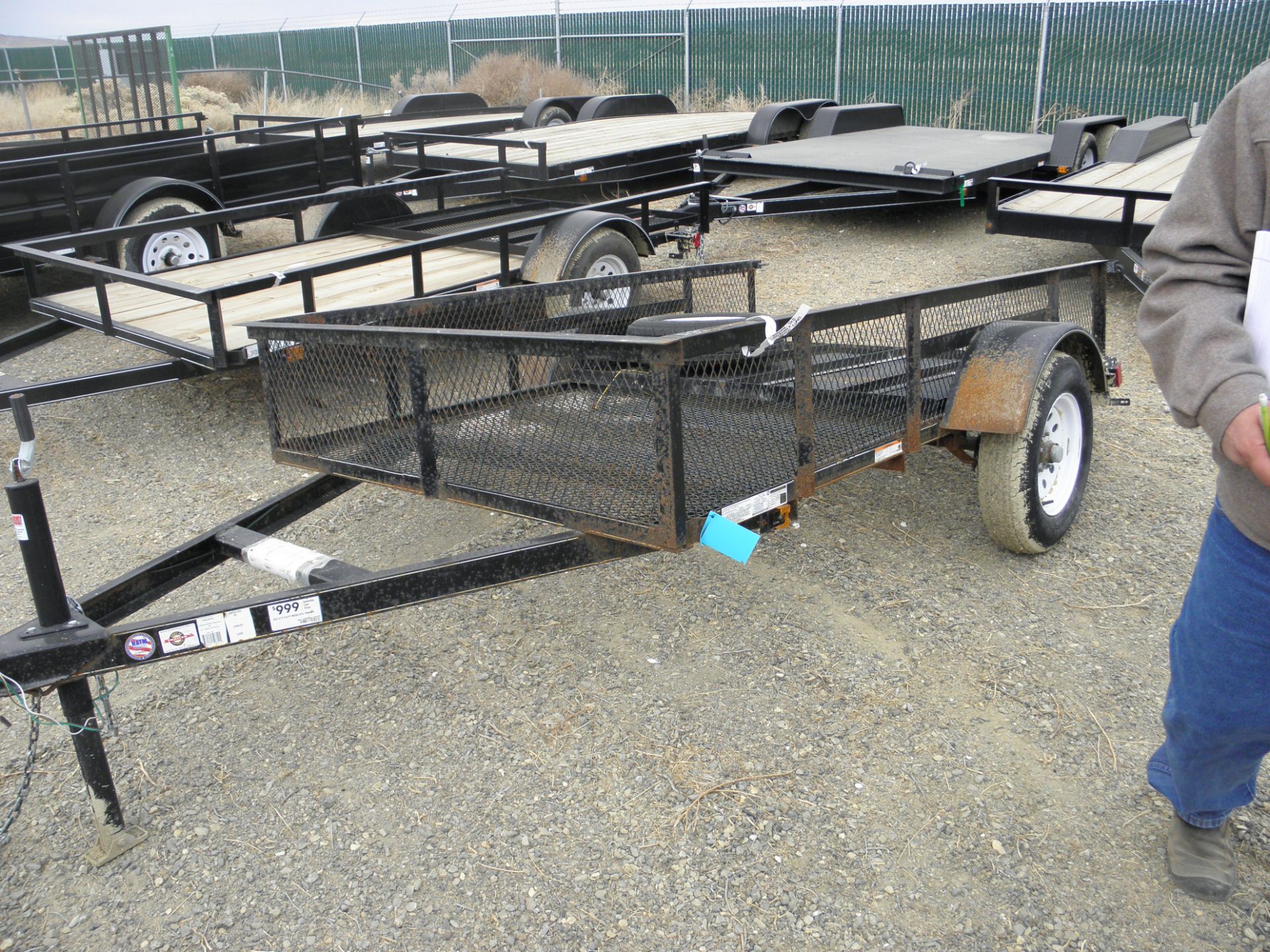5' X 8' single alxe flatbed  w/rail sides, rear fold up ramps, expanded metal deck(used)