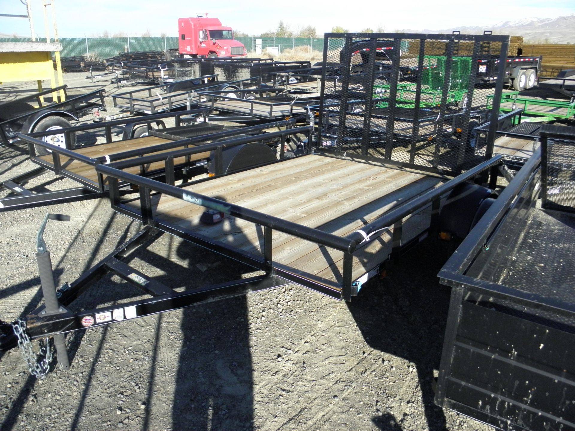 6' X 8' single axle flatbed w/pipe rail side, expanded metal ramp, wood deck(damaged fenders)