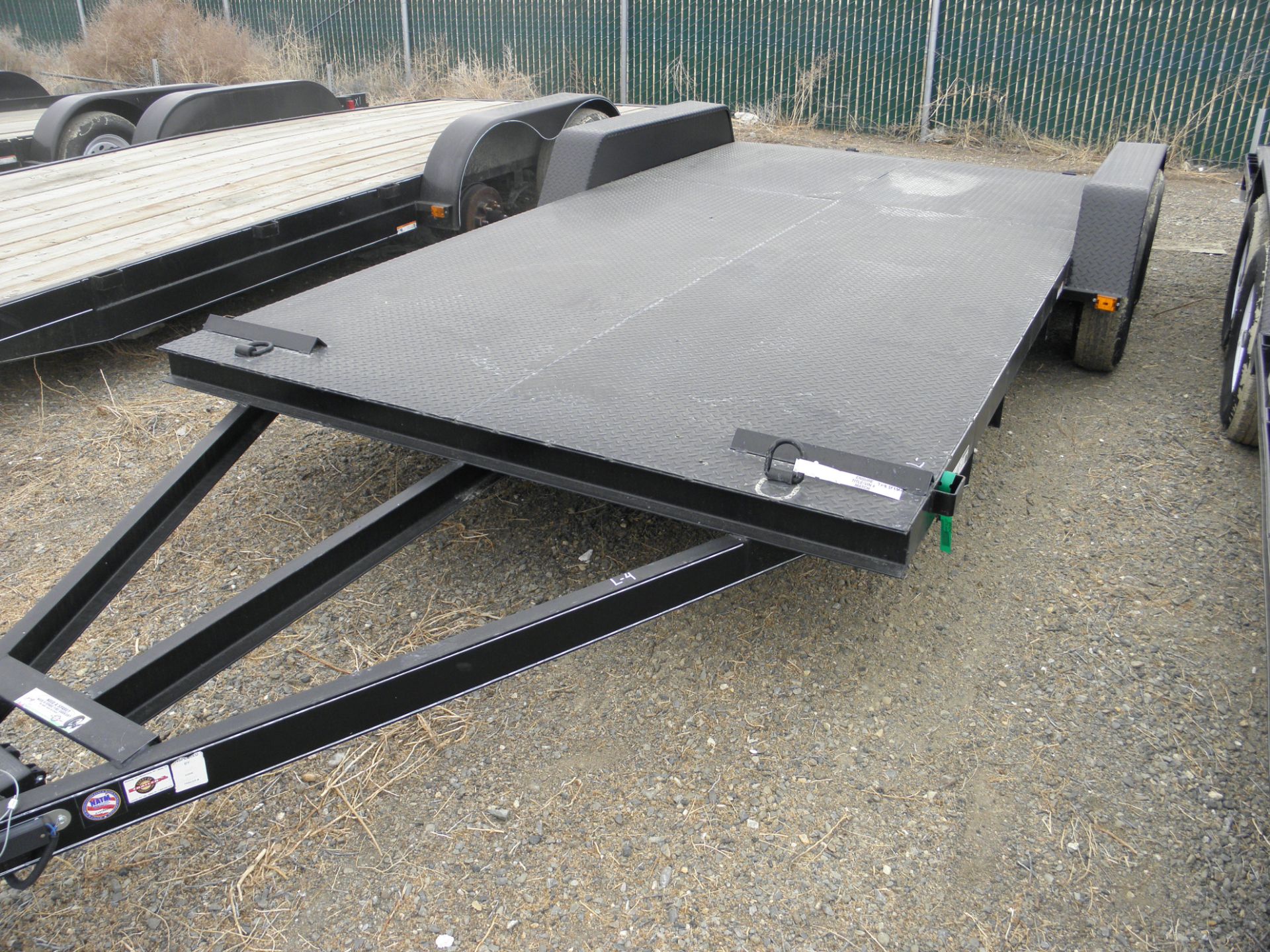 2015 7' X 18' tandem axle flatbed diamond plate deck w/beaver tail