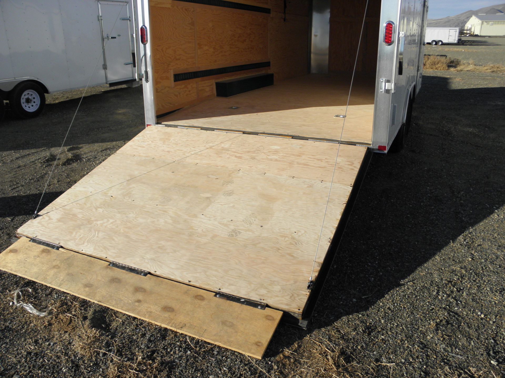 2014 7' X 14' tandem axle enclosed cargo, fold down rear door, side door, 7' tall