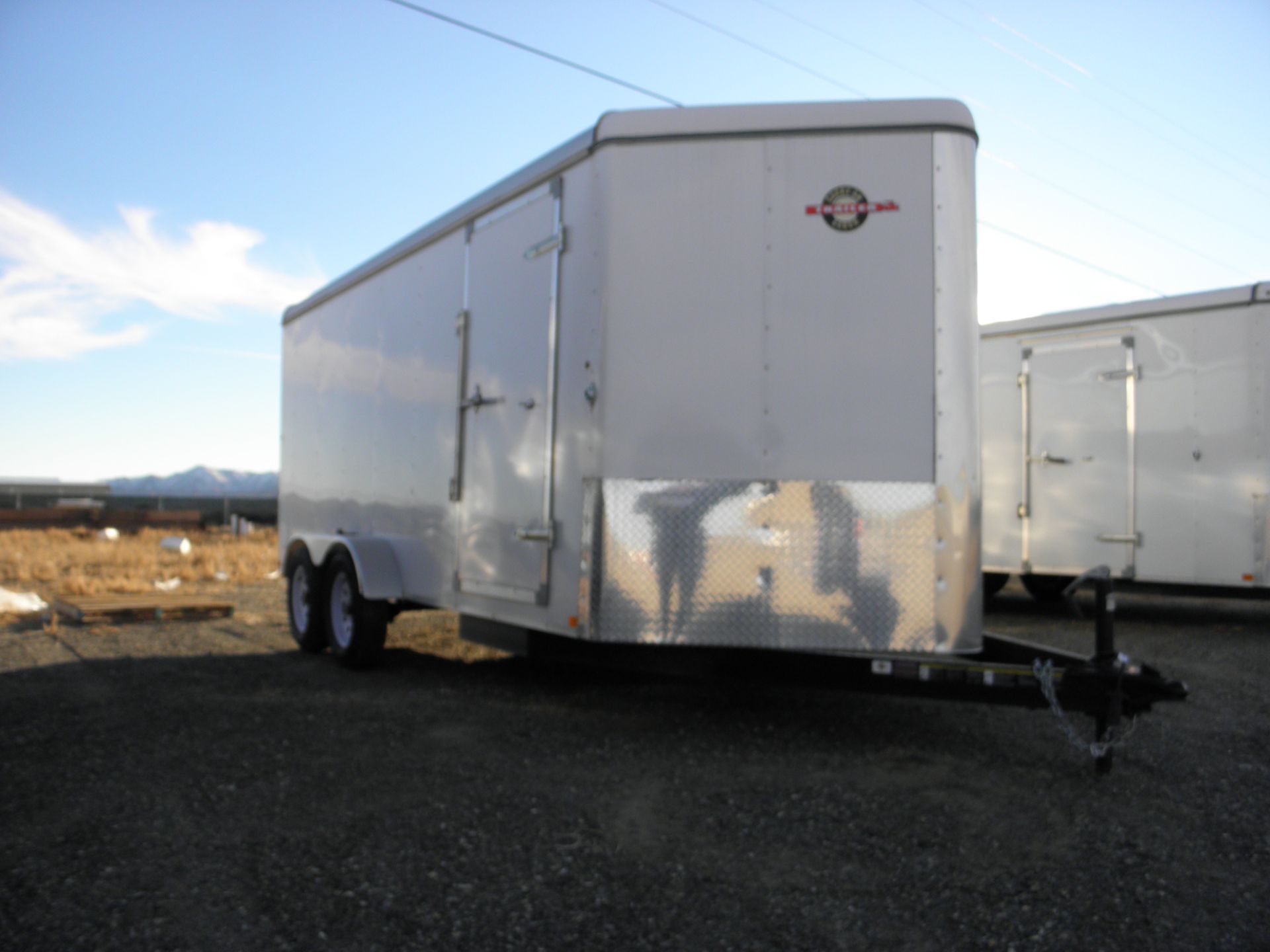 2014 7' X 16' tandem axle enclosed cargo, fold down rear door, side door, V nose