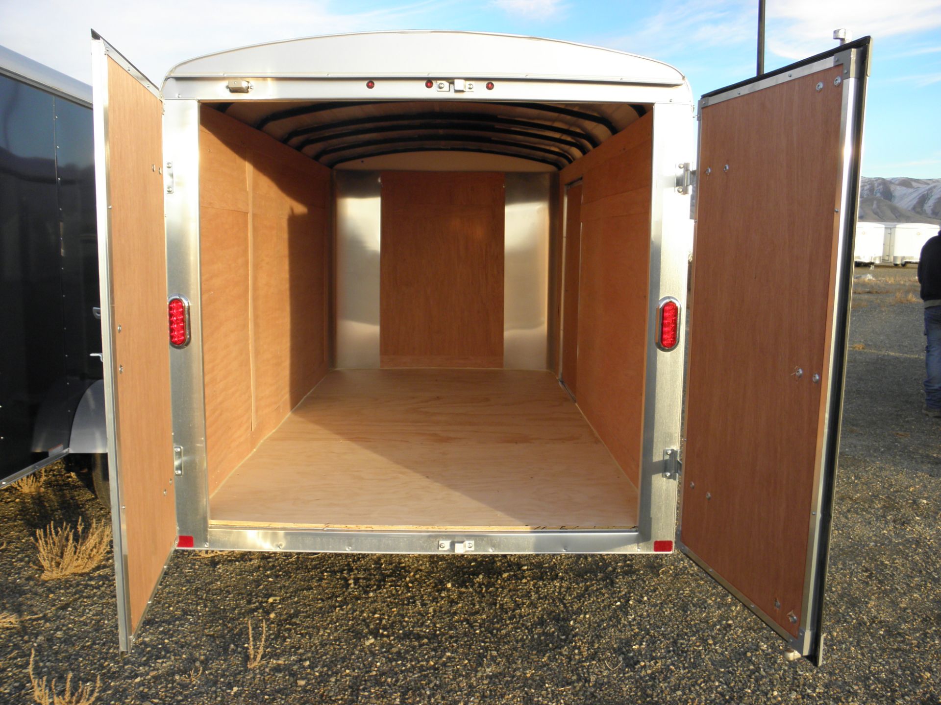 2015 7' X 16' tandem axle enclosed cargo, rear barn doors, side door, wood lined