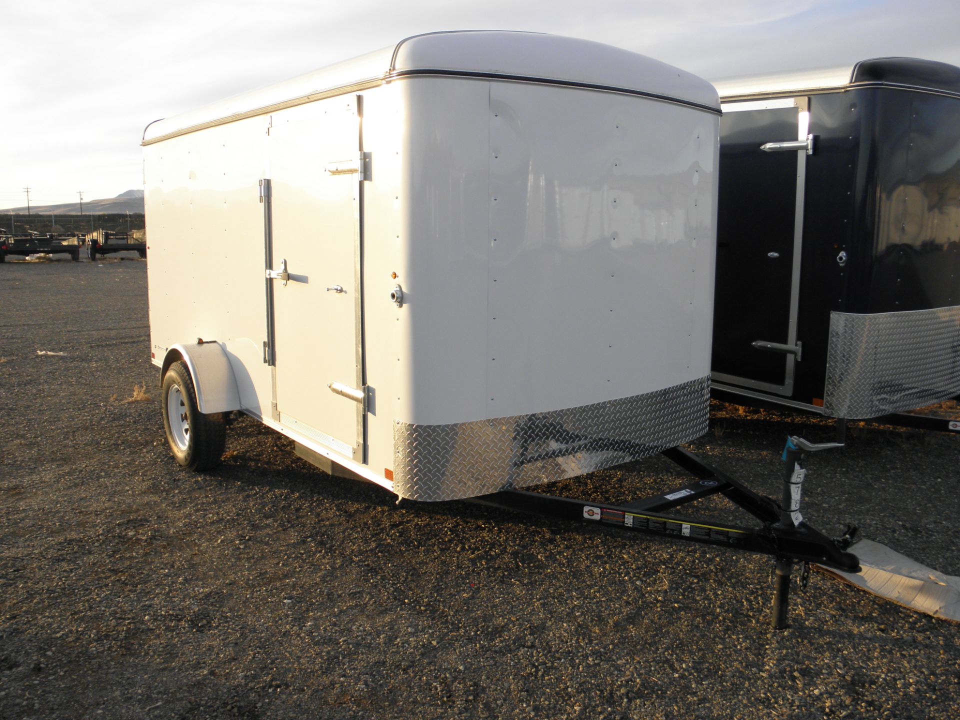 6' X 12' single axle enclosed cargo, barn rear doors, wood lined, white 5  Â½' tall