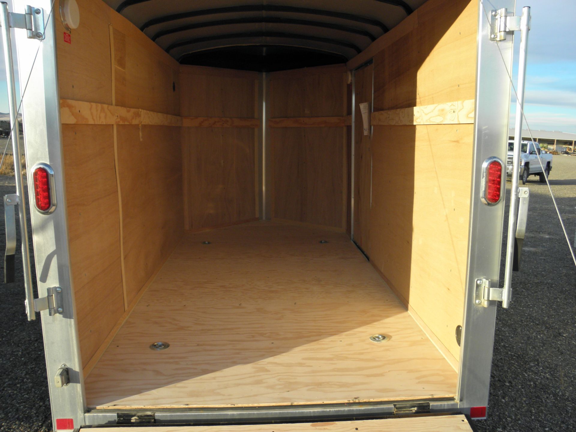 2015 7' X 14' tandem axle enclosed cargo, fold down rear door, side door wood lined