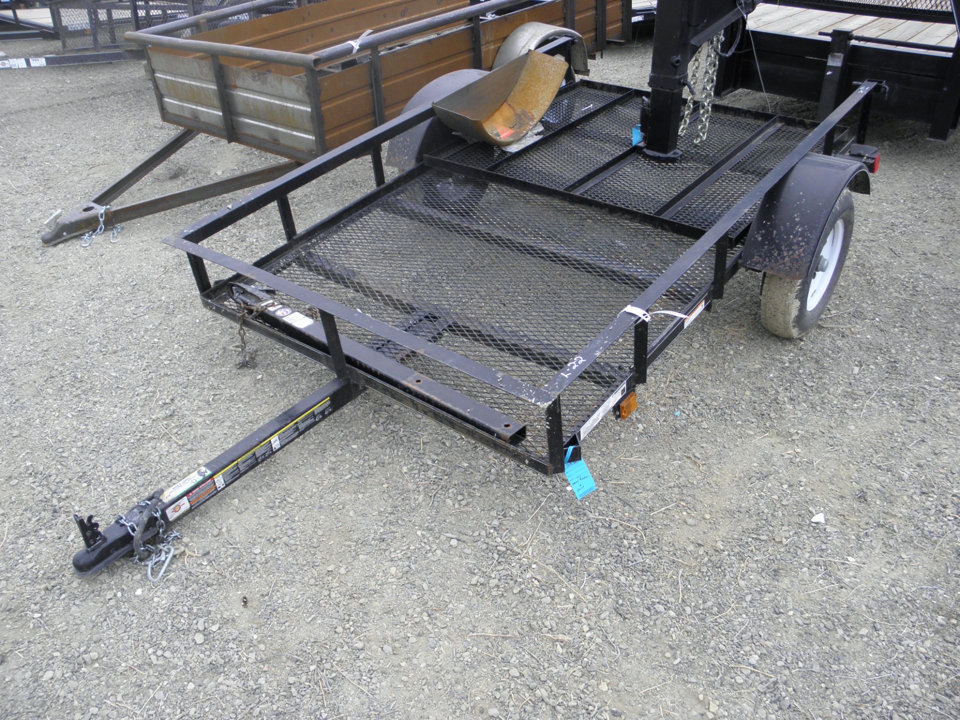 5' X 8' single axle flatbeds w/rear fold up ramps, expanded metal deck