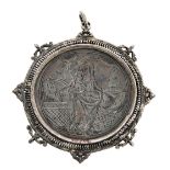 Castilian "patena llana" pendant, second half of the 16th Century Chiselled silver. With