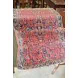 A Middle Eastern rectangular woollen rug
