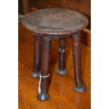 Tribal Art - an African stool, circular