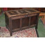 An oak blanket box, three panelled hinge