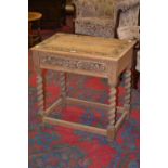 A 17th century style oak side table, the