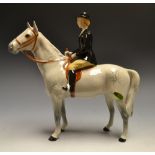 A Beswick model huntswoman on grey horse